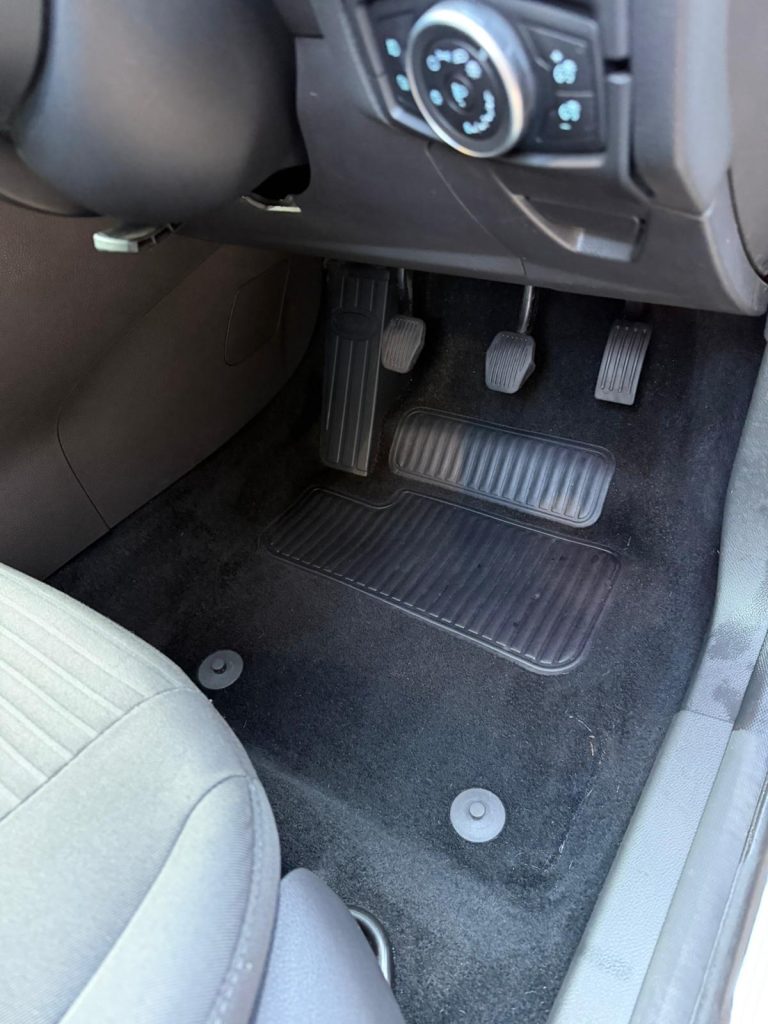 Driver footwell carpet after a deep shampoo